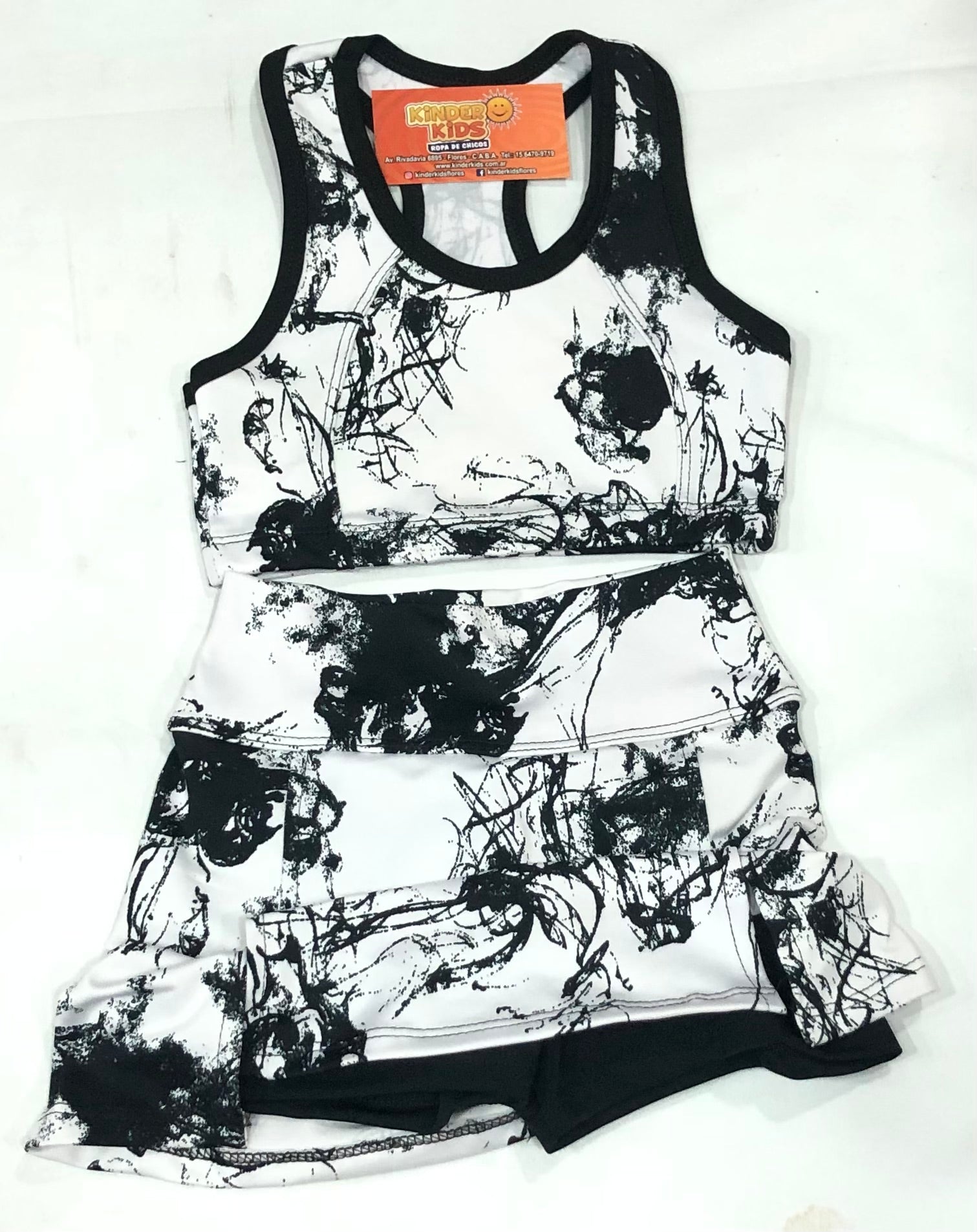 CONJUNTO Short Pollera con top de lycra estampas varias
