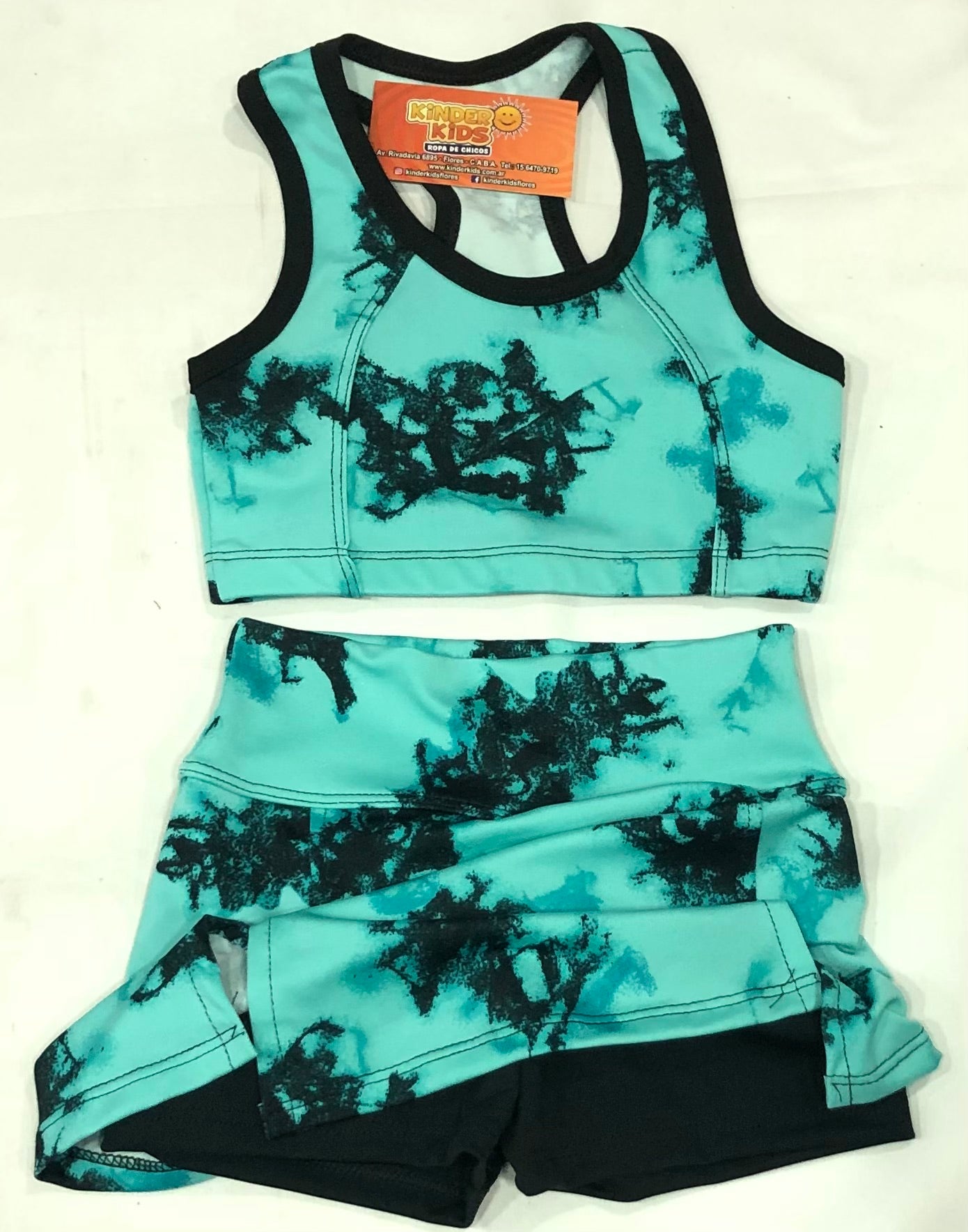 CONJUNTO Short Pollera con top de lycra estampas varias
